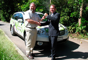 Zoos SA Cheif Executive Dr. Chris West accpeting the keys from Peter Scherer, Jarvis Subaru General Manager