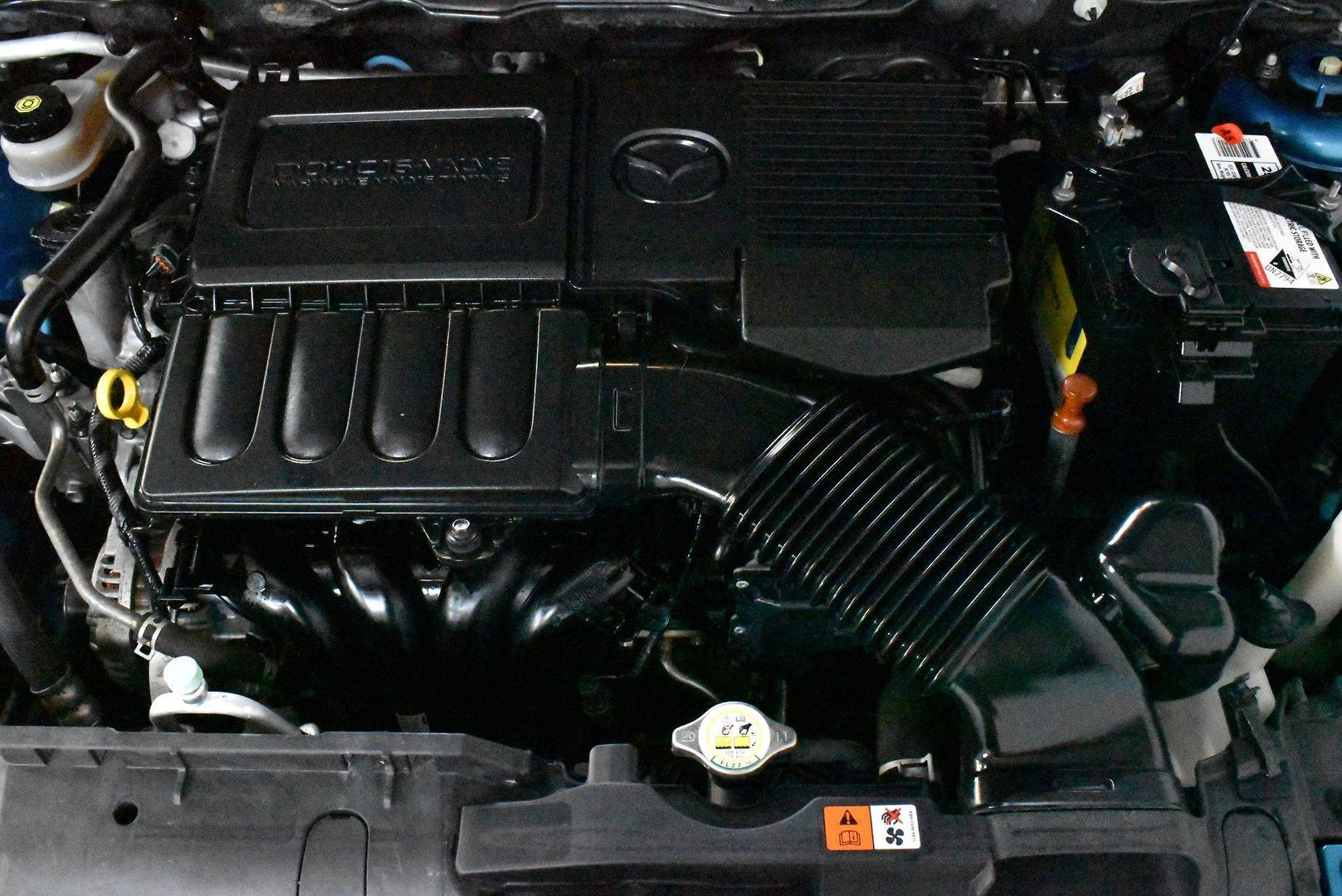 2012 Mazda 2 Neo — photo 17 of 25