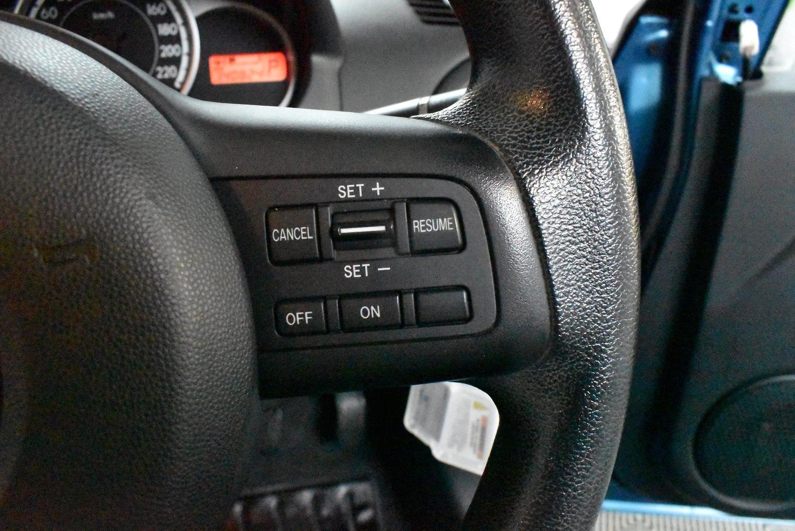 2012 Mazda 2 Neo — photo 22 of 25