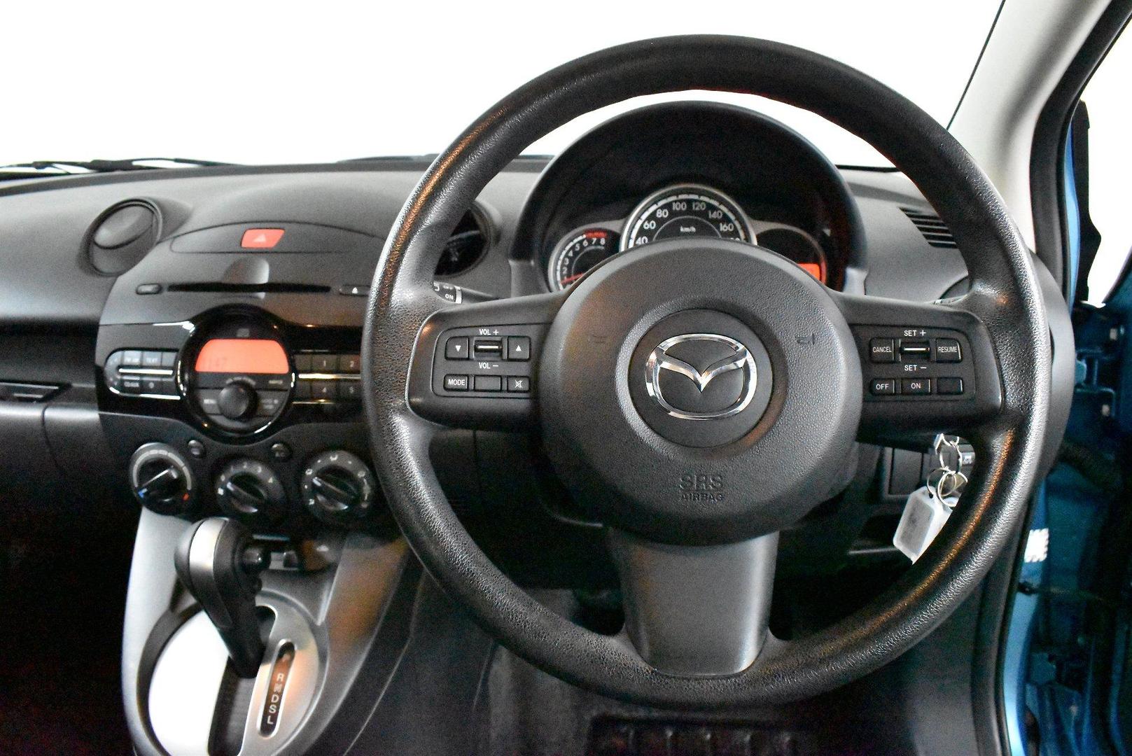 2012 Mazda 2 Neo — photo 5 of 25